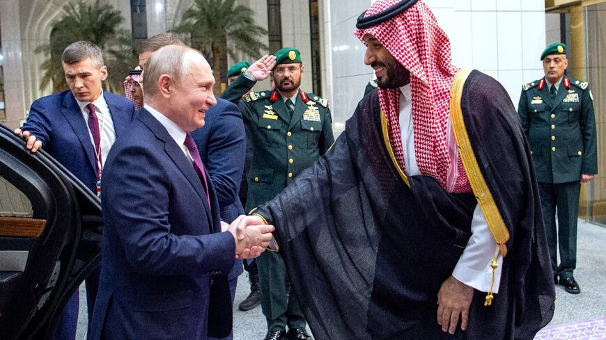 Russian President Vladimir Putin is greeted by Saudi Crown Prince Mohammed bin Salman in Riyadh