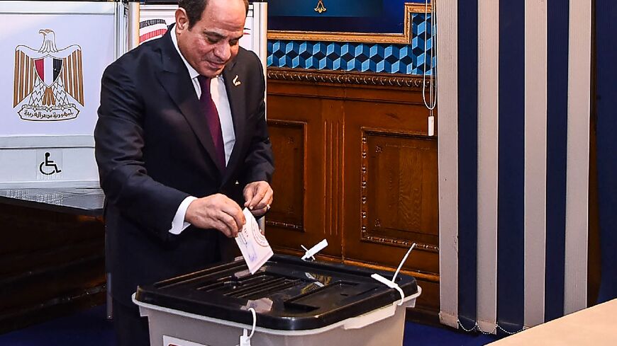 Egyptian President Abdel Fattah al-Sisi cast his vote at a school in Cairo