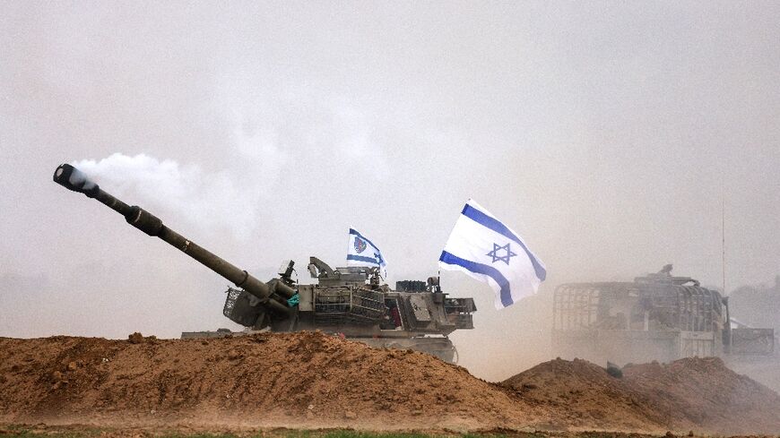 Israel continued to pound Gaza with heavy artillery 