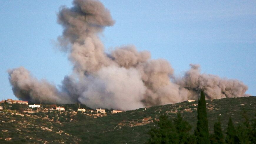 Smoke billows following Israeli strikes in the southern Lebanese village of Majdal Zoun near the border on December 15, 2023, amid ongoing cross-border tensions as fighting continues between Israel and Hamas militants in Gaza