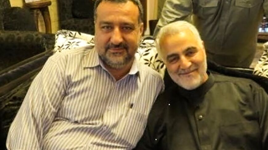 This undated picture released by Iran's Tasnim news agency shows Razi Moussavi (L), a senior adviser for Iran's Islamic Revolutionary Guard Corps (IRGC), alongside IRGC Quds Force commander Qasem Soleimani, who was killed in 2020