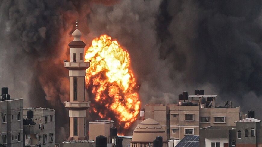A fireball erupts after an Israeli strike over Rafah, in the southern Gaza Strip, where many Gazans have fled