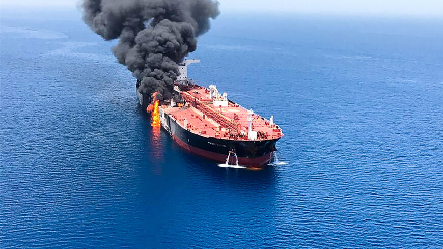A picture obtained by AFP from Iranian News Agency ISNA on June 13, 2019, reportedly shows fire and smoke billowing from Norwegian-owned Front Altair tanker said to have been attacked in the waters of the Gulf of Oman