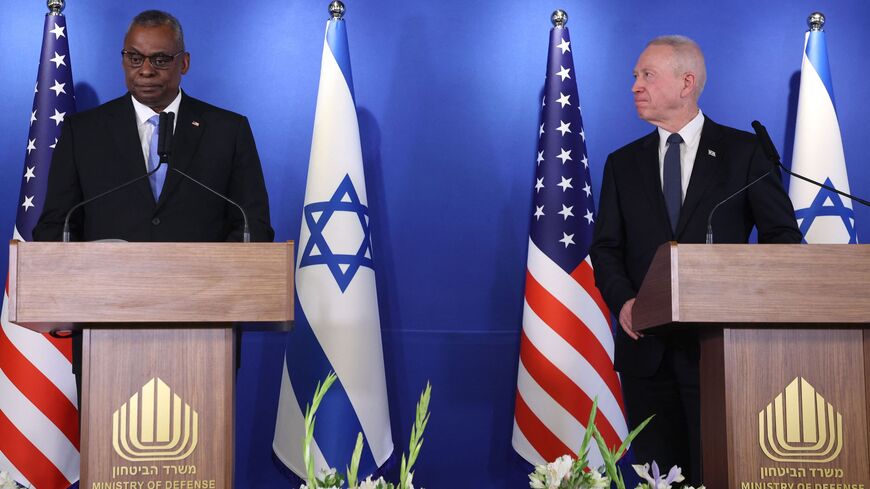 Israeli Minister of Defence Yoav Gallant (R) and US Secretary of Defense Lloyd Austin deliver a statement to the press at the Israel Aerospace Industries (IAI) headquarters near the Ben Gurion airport in Tel Aviv, on March 9, 2023.  