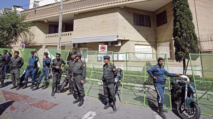 Policemen stand guard outside Sweden's embassy in Tehran on June 30 2023, during a demonstration denouncing the burning of Islam's holy book. 