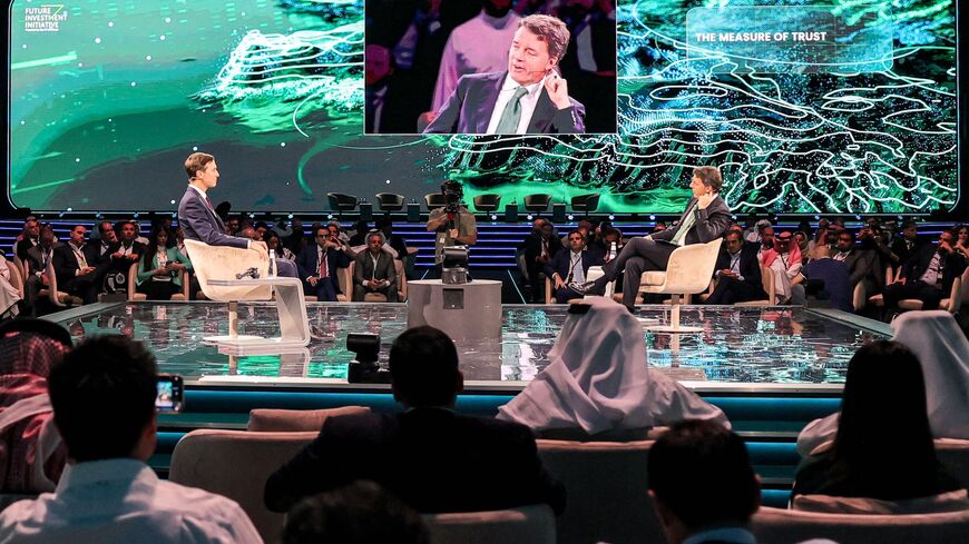 Jared Kushner (R), adviser to former US president Donald Trump, and Italy's former prime minister Matteo Renzi (L) participate in a panel at the annual Future Investment Initiative (FII) conference in Riyadh on Oct. 25, 2023. 