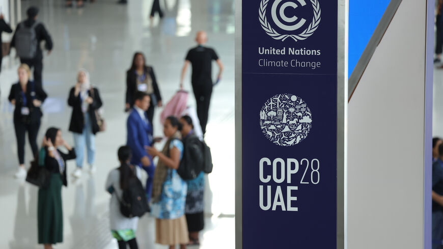 DUBAI, UNITED ARAB EMIRATES - NOVEMBER 29: A banner hangs in a venue at the UNFCCC COP28 Climate Conference the day before its official opening on November 29, 2023 in Dubai, United Arab Emirates. The COP28 is bringing together stakeholders, including international heads of state and other leaders, scientists, environmentalists, indigenous peoples representatives, activists and others to discuss and agree on the implementation of global measures towards mitigating the effects of climate change. (Photo by Se