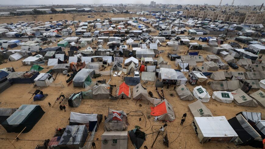 Tents and makeshift shelters at a camp for displaced Palestinians in Rafah, southern Gaza Strip, where most civilians have taken refuge as battles continue between Israel and the Palestinian militant group Hamas, Dec. 13, 2023.