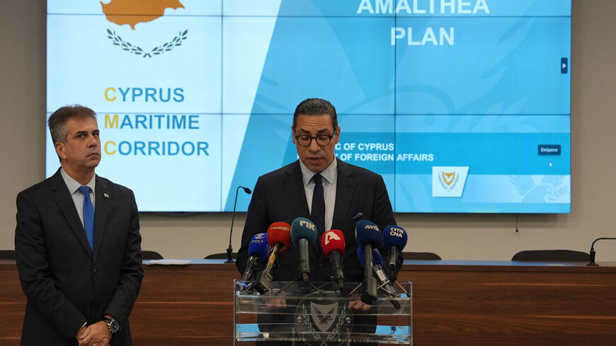 Israel's Foreign Minister Eli Cohen (R) and his Cypriot counterpart Constantinos Kombos give a press conference in Larnaca on December 20, 2023 talking about a humanitarian aid corridor from the Mediterranean island to war-torn Gaza. (Photo by Elisa AMOURET / AFP) (Photo by ELISA AMOURET/AFP via Getty Images)