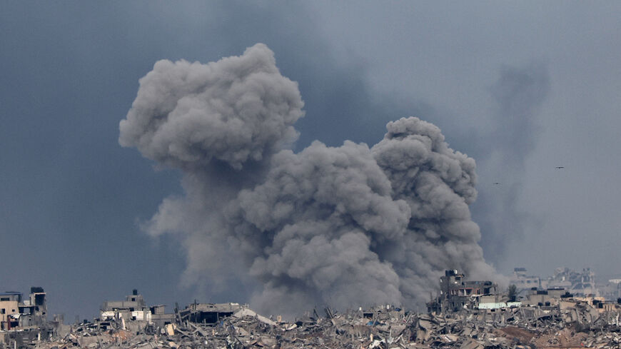 Smoke billowing following Israeli bombardment in southern Gaza amid ongoing battles with the Palestinian Hamas militant group, Dec. 21, 2023. 
