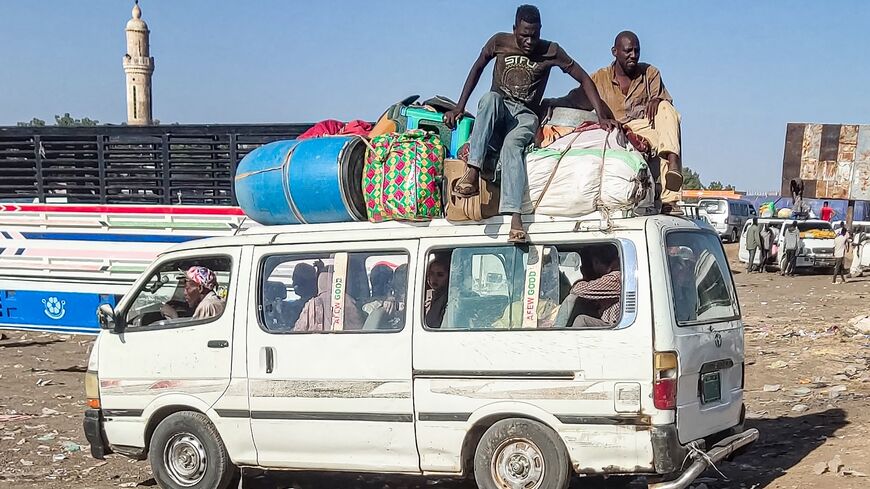 Displaced people fleeing al-Jazeera state arrive in Gedaref in the east of war-torn Sudan on Dec. 22, 2023.