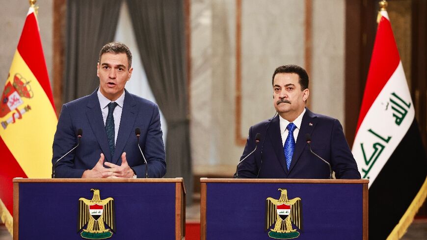 Iraq's Prime Minister Mohamed Shia al-Sudani (R) and Spain's Prime Minister Pedro Sanchez in Baghdad