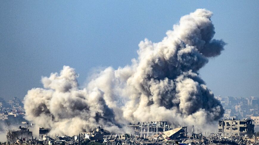 Smoke rising from buildings hit by Israeli strikes in Gaza