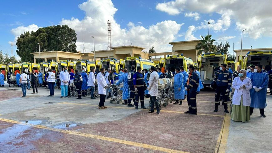 Egyptian medics prepare to receive premature babies evacuated from Gaza at the Rafah crossing on November 20