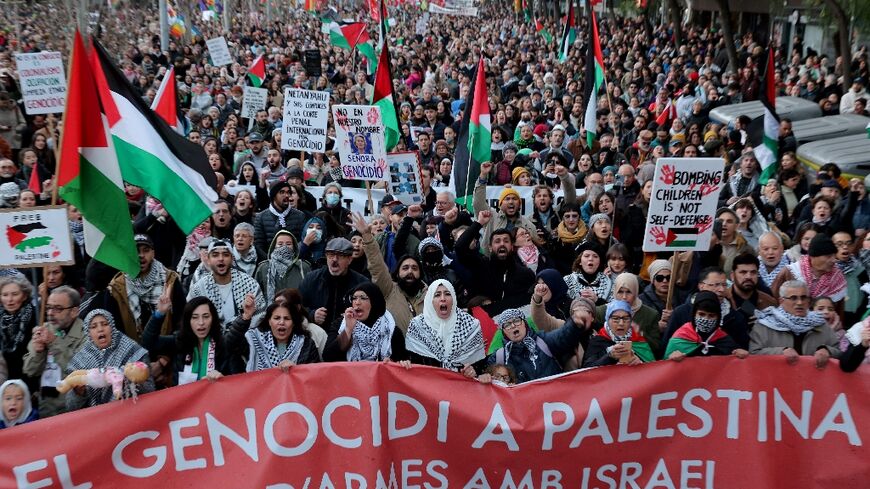 Many carried Palestinian flags or placards denouncing what they said was the 'genocide' in Gaza