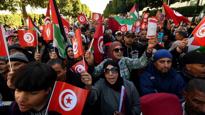 Tunisians protest to mark the anniversary of the 2011 uprising