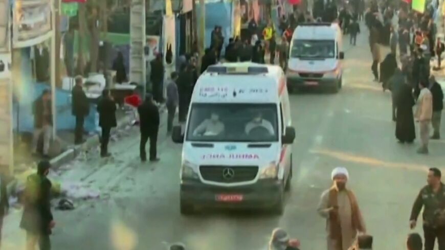 Video released by state-run Iran Press news agency on January 3, 2024 shows ambulances leaving the site where two explosions struck a crowd marking the anniversary of the 2020 killing of Guards general Qasem Soleimani