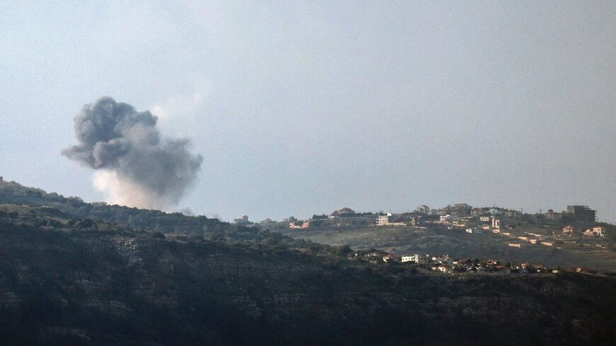 This picture taken from an Israeli position along the border with southern Lebanon shows smoke billowing above the Lebanese village of Hula during Israeli bombardment