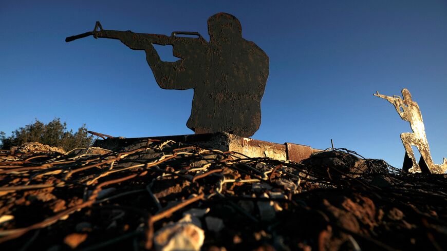 A metal cutout of an Israeli soldier at an army post in Mount Bental near the Syrian border in the Israeli-annexed Golan Heights on February 9, 2022. - Israel launched strikes against targets in Syria early today, hitting anti-aircraft batteries in response to a missile fired from Syria, the military said. (Photo by JALAA MAREY / AFP) (Photo by JALAA MAREY/AFP via Getty Images)