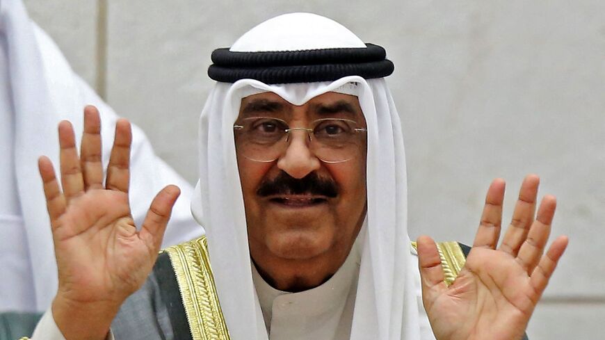 Emir of Kuwait Sheikh Meshal al-Ahmad al-Sabah gestures as he delivers a speech during the opening ceremony of the 17th parliamentary term at the National Assembly in Kuwait City on Oct. 18, 2022.