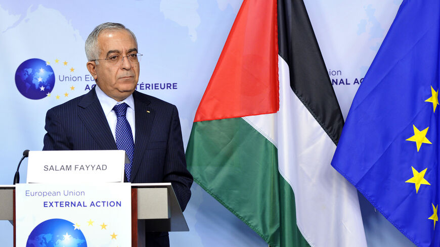 Palestinian Prime Minister Salam Fayyad makes a statement to the press on March 19, 2013 before a signing ceremony at EU headquarters in Brussels ahead of the opening of the annual coordination meeting of Palestinian aid donors.
