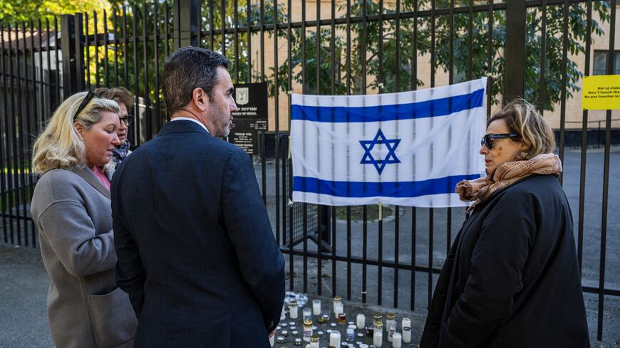 Israeli ambassador to Sweden, Ziv Nevo Kulman (C) meets with people as they show their solidarity and support outside the Israeli embassy in Stockholm, Sweden, on October 9, 2023, after the surprise attack by Palestinian militant group Hamas against Israel. (Photo by Jonathan NACKSTRAND / AFP) (Photo by JONATHAN NACKSTRAND/AFP via Getty Images)