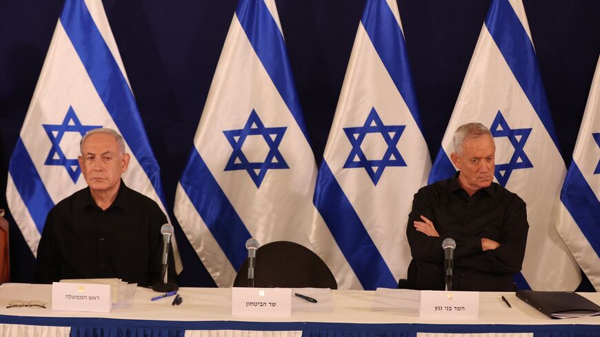 Israeli Prime Minister Benjamin Netanyahu and Cabinet Minister Benny Gantz attend a press conference in the Kirya military base in Tel Aviv on October 28, 2023 amid ongoing battles between Israel and the Palestinian group Hamas.