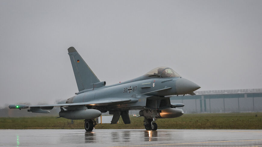 A Eurofighter jet of the TacticalAir Force Wing 71 "Richthofen" of the German Armed Forces Bundeswehr approaches during the Hannover Shield exercise at the airport in Hannover, northern Germany, Nov. 27, 2023.