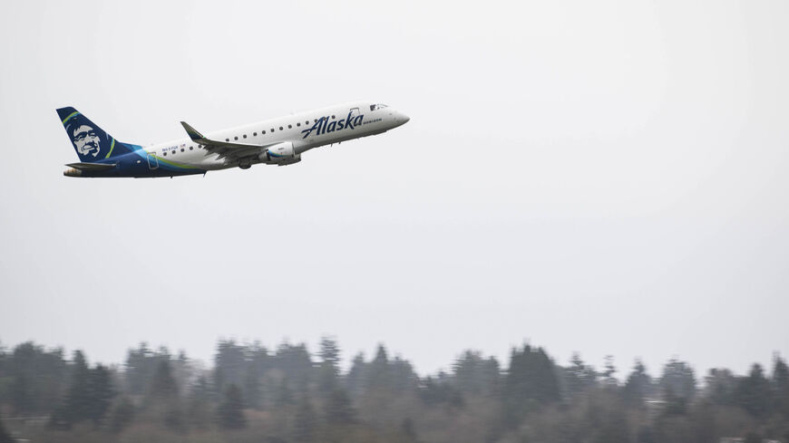 PORTLAND, OREGON - JANUARY 9: An Alaska Airlines Embraer aircraft is seen taking off at Portland International Airport on January 9, 2024 in Portland, Oregon. NTSB investigators are continuing their inspection on the Alaska Airlines N704AL Boeing 737 MAX 9 aircraft following a midair fuselage blowout on Friday, January 5. None of the 171 passengers and six crew members were seriously injured. (Photo by Mathieu Lewis-Rolland/Getty Images)