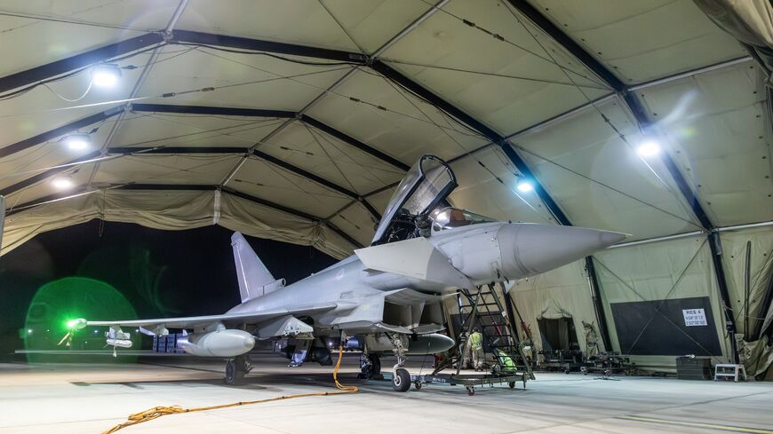 In this handout image provided by the UK Ministry of Defense, an RAF Typhoon aircraft returns to berth following a strike mission on Yemen's Houthi rebels at RAF Akrotiri on Jan. 12, 2024.