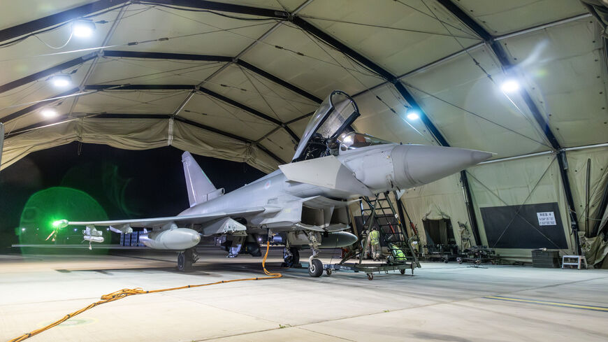 AKROTIRI, CYPRUS - JANUARY 12: In this handout image provided by the UK Ministry of Defence, an RAF Typhoon aircraft returns to berth following a strike mission on Yemen's Houthi rebels at RAF Akrotiri on January 12, 2024 in Akrotiri, Cyprus. On Thursday evening, four RAF Typhoons launched from RAF Akrotiri to conduct strikes against Yemen's Houthi rebels, who have been targeting merchant vessels in the Red Sea and Gulf of Aden with missiles and drones. According to British Prime Minister Rishi Sunak, the s