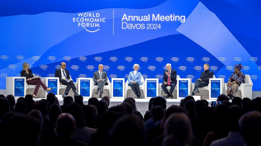 (L-R) Bloomberg Television's journalist Francine Lacqua, Singapore's President Tharman Shanmugaratnam, Saudi Finance Minister Mohammed al-Jadaan, President of the European Central Bank (ECB) Christine Lagarde, Co-chairman of the private equity firm of The Carlyle Group David Rubenstein, German Finance Minister Christian Lindner and World Trade Organization (WTO) Director-General Ngozi Okonjo-Iweala attend a session on the closing day of the World Economic Forum (WEF) annual meeting in Davos, on January 19, 
