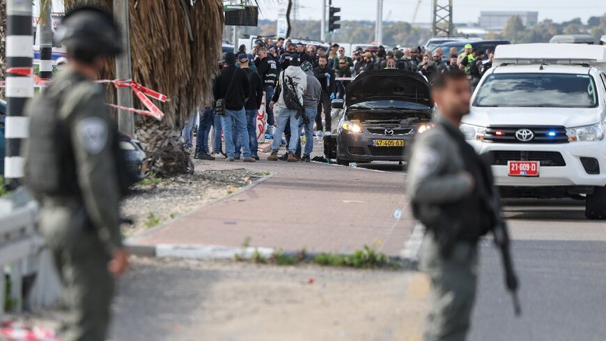 Israeli security forces secure the scene of a deadly shooting in the southern town of Kiryat Malakhi on February 16