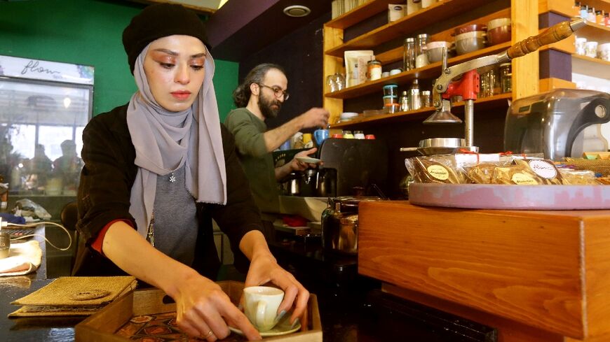 Cafes in Syria's capital Damascus have become a source of reliable wifi and power