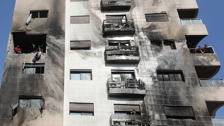 The strike hit a nine-storey building whose outside has been partially blackened, with damaged centred around the fourth floor