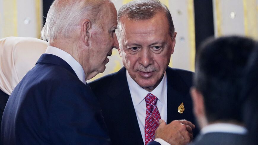 US President Joe Biden (L) speaks with Turkish President Recep Tayyip Erdogan during a meeting as part of the G20 summit in Nusa Dua on the Indonesian resort island of Bali on November 15, 2022. (Photo by Made NAGI / POOL / AFP) (Photo by MADE NAGI/POOL/AFP via Getty Images)
