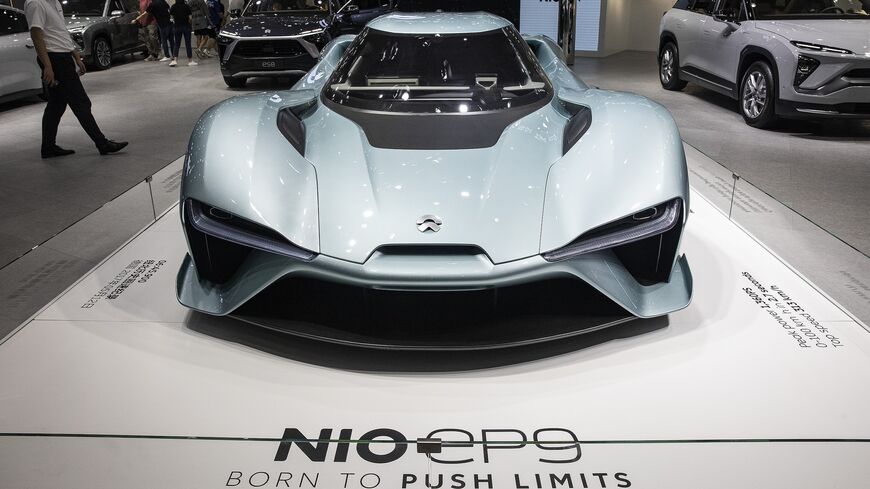 Attendees look around the at NIO EP9 during the 2022 Central China International Auto Show on July 14, 2022, in Wuhan, Hubei province, China.