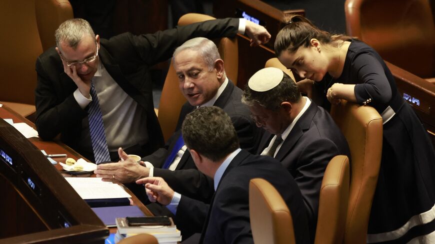 Israeli Prime Minister Benjamin Netanyahu (C) attends a Knesset meeting, Jerusalem, July 10, 2023.