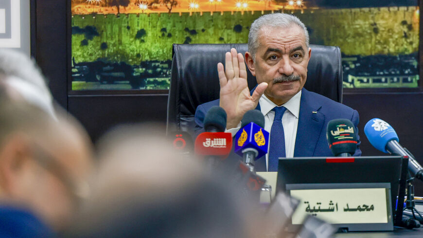 Palestinian Prime Minister Mohammad Shtayyeh chairs a cabinet meeting amid ongoing battles between Israel and Hamas in the Gaza Strip, Ramallah, West Bank, Feb. 20, 2024.
