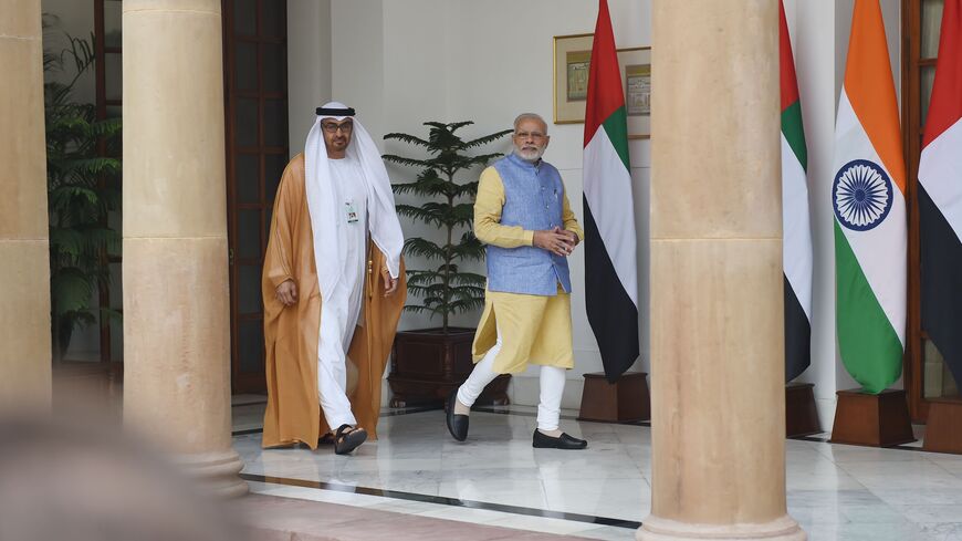 The Crown Prince of Abu Dhabi General Sheikh Mohammed Bin Zayed Al Nahyan (L) walks with Indian Prime Minister Narendra Modi ahead of a meeting in New Delhi on January 25, 2017. The Crown Prince of Abu Dhabi General Sheikh Mohammed Bin Zayed Al Nahyan is on an official visit to India and will be the guest of honour at the country's forthcoming Republic Day celebrations. / AFP / Money SHARMA (Photo credit should read MONEY SHARMA/AFP via Getty Images)