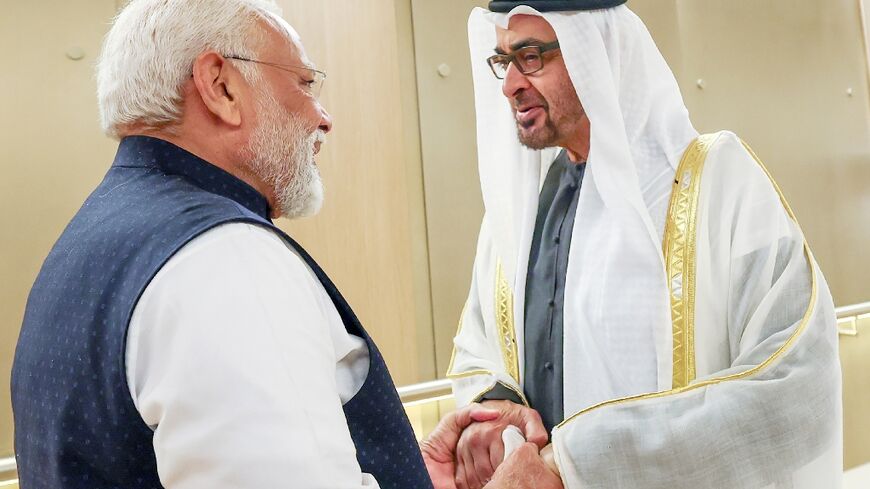 Indian Prime Minister Narendra Modi being welcomed by UAE President Sheikh Mohamed bin Zayed Al Nahyan