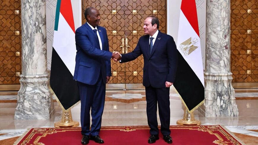 Egyptian President Abdel Fattah al-Sisi (R) hosts Gen. Abdel Fattah al-Burhan of Sudan, in Cairo, Feb. 29, 2024.