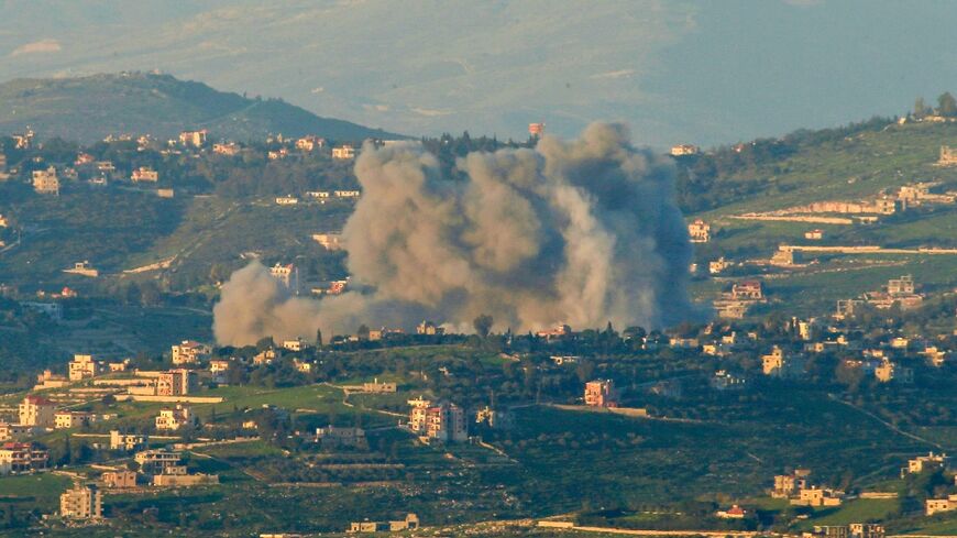 Smoke billows after an Israeli strike on Lebanon's southern village of Hula