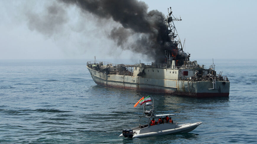 Iran's elite Revolutionary Guard boats attack a naval vessel during a three-day military drill in the Gulf on April 22, 2010. 