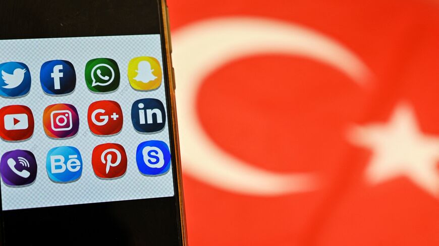 This picture taken on Sept. 30, 2020, shows logos of social-networking websites displayed on a mobile phone's screen in Istanbul. 