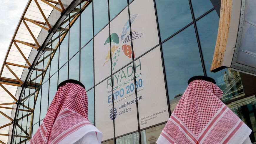 Attendees wearing traditional dress arrive at the Grand Palais Ephemere for the Riyadh 2030 reception event to promote Riyadh's candidacy for 2030 World Expo, in Paris on June 19, 2023. (Photo by Ludovic MARIN / AFP) (Photo by LUDOVIC MARIN/AFP via Getty Images)