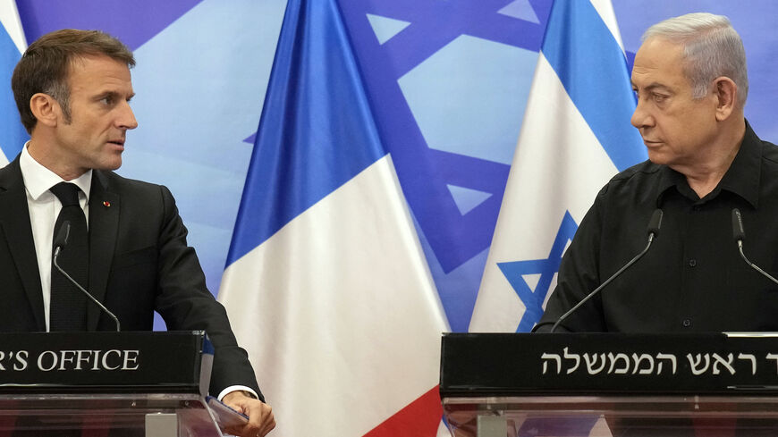Israeli Prime Minister Benjamin Netanyahu (R) and French President Emmanuel Macron (L) hold a joint press conference in Jerusalem on Oct. 24, 2023. 