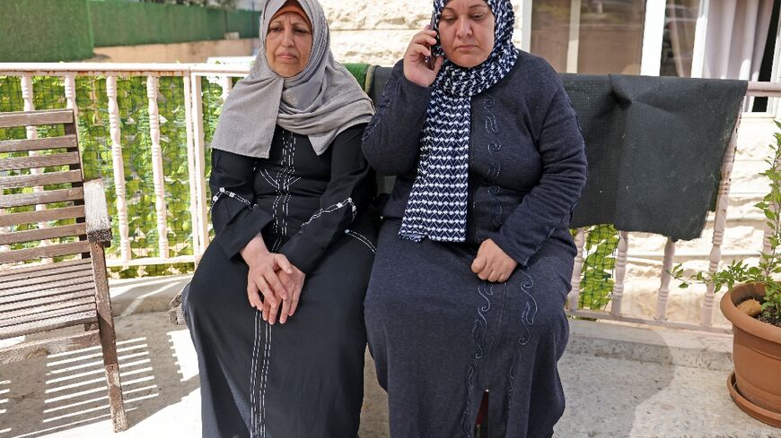 Palestinians Rim Abu Obeida (L) and Manal Abu Shaaban are waiting anxiously to learn if they'll be sent back to war-torn Gaza