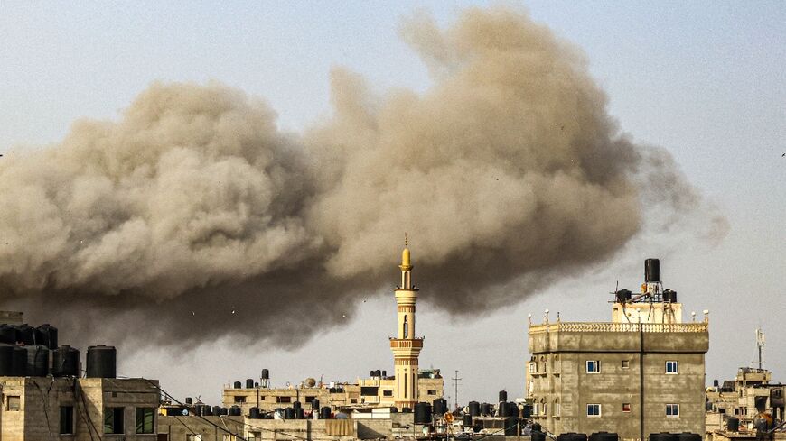 Smoke billows following Israeli bombardment in Rafah, in the southern Gaza Strip, on March 27, 2024