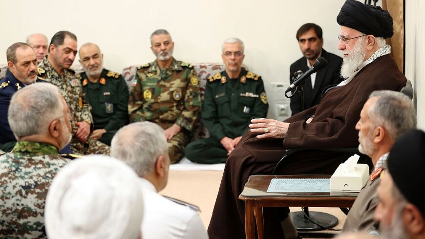 A handout picture provided by the office of Iran's Supreme Leader Ayatollah Ali Khamenei showing him speaking to commanders of the Iranian armed forces a week after Tehran's direct attack on Israel